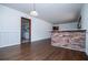 Bright dining room features hardwood floors and a brick breakfast bar at 2283 Country Club Sw Ln, Atlanta, GA 30311