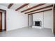 Gathering room with fireplace and wood beams at 2283 Country Club Sw Ln, Atlanta, GA 30311