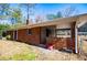 Brick back of house with covered patio at 2283 Country Club Sw Ln, Atlanta, GA 30311