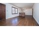 Spacious living room with hardwood floors and brick half wall at 2283 Country Club Sw Ln, Atlanta, GA 30311