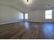 Large bonus room with hardwood floors and multiple windows at 28 Samuel Nw Way, Cartersville, GA 30121