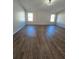 Spacious bonus room with hardwood floors and recessed lighting at 28 Samuel Nw Way, Cartersville, GA 30121