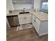 Modern kitchen featuring granite countertops and stainless steel appliances at 28 Samuel Nw Way, Cartersville, GA 30121