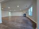 Open living room with hardwood floors and recessed lighting at 28 Samuel Nw Way, Cartersville, GA 30121