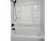 Bathroom features an all-white fiberglass shower with built-in shelving and black showerhead at 28 Samuel Nw Way, Cartersville, GA 30121