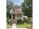 Charming two-story house with a well-manicured lawn at 301 Fortune Ne St, Atlanta, GA 30312