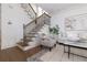 Comfortable living room with a staircase and neutral decor at 301 Fortune Ne St, Atlanta, GA 30312