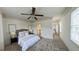 Spacious main bedroom with a ceiling fan and neutral decor at 301 Fortune Ne St, Atlanta, GA 30312