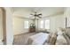 Cozy main bedroom with a ceiling fan, natural lighting, and neutral decor at 301 Fortune Ne St, Atlanta, GA 30312