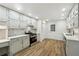 Renovated kitchen, featuring stainless steel appliances and light cabinets at 332 Stonecutters Cv, Stockbridge, GA 30281