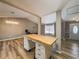 White kitchen island with butcher block countertop at 5912 Jacobs Rd, Acworth, GA 30102