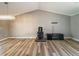 Spacious living room featuring a wood-burning stove and hardwood floors at 5912 Jacobs Rd, Acworth, GA 30102