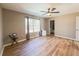 Main bedroom with ceiling fan, window, and en-suite bath at 5912 Jacobs Rd, Acworth, GA 30102