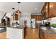 Kitchen with granite countertops, stainless steel appliances, and center island with pendant lights at 6310 Fox Creek Dr, Cumming, GA 30040