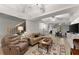 Spacious living room featuring neutral tones, and tile floors at 6310 Fox Creek Dr, Cumming, GA 30040