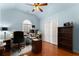 Inviting home office with ample desk space, built-in shelving, and natural light at 6310 Fox Creek Dr, Cumming, GA 30040