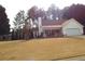 Ranch style home with attached garage and front porch at 115 The Falls Blvd, Covington, GA 30016