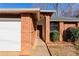 Brick facade with a walkway leading to the front door at 1440 Teaberry Cir, Lawrenceville, GA 30044