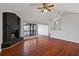 Living room with a brick fireplace and vaulted ceiling at 1440 Teaberry Cir, Lawrenceville, GA 30044