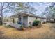 Gray brick ranch house with covered patio at 1937 Windsor Sw Dr, Atlanta, GA 30311