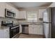 Newly remodeled kitchen with stainless steel appliances at 1937 Windsor Sw Dr, Atlanta, GA 30311