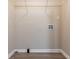 Well-lit laundry room with shelving and hookups at 1937 Windsor Sw Dr, Atlanta, GA 30311