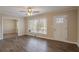 Bright living room with hardwood floors and large windows at 1937 Windsor Sw Dr, Atlanta, GA 30311