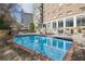 Sparkling community pool with plenty of seating and a great city view at 215 Piedmont Ne Ave # 1707, Atlanta, GA 30308