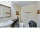 Well-appointed basement bathroom with a pedestal sink at 2976 Cambridge Hill Dr, Dacula, GA 30019