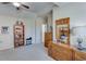 Bedroom with wooden dresser and shelving unit at 2976 Cambridge Hill Dr, Dacula, GA 30019