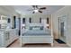 Bright bedroom with a comfortable bed and access to a private deck at 2976 Cambridge Hill Dr, Dacula, GA 30019