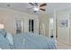 Spacious bedroom with large bed and adjacent bathroom at 2976 Cambridge Hill Dr, Dacula, GA 30019