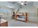 Bedroom with wooden bunk bed and built-in shelving at 2976 Cambridge Hill Dr, Dacula, GA 30019