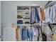 Well-organized walk-in closet with ample shelving and hanging space at 2976 Cambridge Hill Dr, Dacula, GA 30019