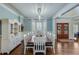 Bright dining room with hardwood floors and built-in hutch at 2976 Cambridge Hill Dr, Dacula, GA 30019