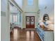 Grand two-story entryway with hardwood floors at 2976 Cambridge Hill Dr, Dacula, GA 30019