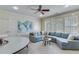 Relaxing Gathering room with large sectional sofa and plenty of natural light at 2976 Cambridge Hill Dr, Dacula, GA 30019