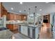 Modern kitchen with granite countertops and large island at 2976 Cambridge Hill Dr, Dacula, GA 30019