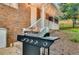 Outdoor patio with gas grill, perfect for summer barbecues at 3490 Turner Heights Dr, Decatur, GA 30032