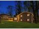 Ranch house with a large grassy yard at dusk at 3490 Turner Heights Dr, Decatur, GA 30032