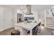 Modern kitchen island with white cabinets and stainless appliances at 3490 Turner Heights Dr, Decatur, GA 30032