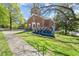 Brick church with a painted sign and landscaping at 1065 United Se Ave # 101, Atlanta, GA 30316