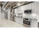 Modern kitchen with stainless steel appliances and white cabinetry at 1065 United Se Ave # 101, Atlanta, GA 30316