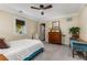 Bright bedroom featuring neutral paint, comfy bed, grey carpet and modern ceiling fan at 1316 North Ne Ave, Atlanta, GA 30307