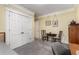 Bedroom with carpeting, a double closet, and small table with chairs at 1316 North Ne Ave, Atlanta, GA 30307