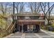 Rear exterior view of a two-story home with a deck, patio, and well-maintained backyard at 1316 North Ne Ave, Atlanta, GA 30307