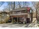 Back exterior view of a two-story home featuring a deck and outdoor living space at 1316 North Ne Ave, Atlanta, GA 30307