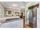 Kitchen featuring granite countertops, stainless appliances and direct views of the dining area at 1316 North Ne Ave, Atlanta, GA 30307