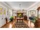 Inviting living room featuring hardwood floors, a fireplace, natural light, and an open floor plan at 1316 North Ne Ave, Atlanta, GA 30307