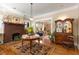 Elegant living room with detailed fireplace, hardwood floors, and an open floor plan at 1316 North Ne Ave, Atlanta, GA 30307